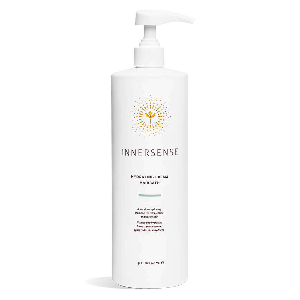A bottle of innersense hydrating cream hairbath against a white background.