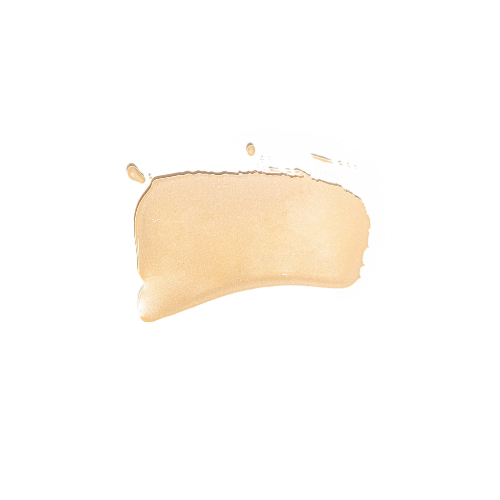 A swatch of liquid foundation makeup isolated on a white background.