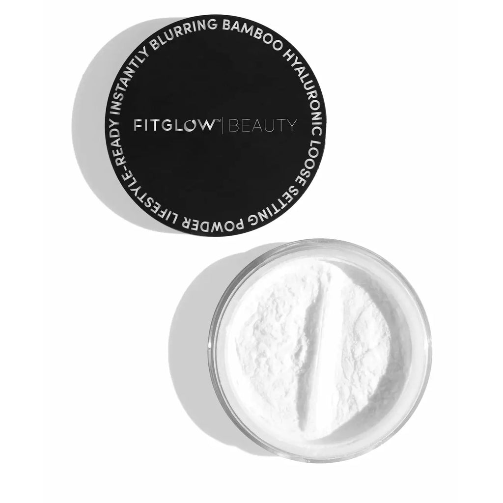 Open container of cosmetic powder next to its lid with product branding.