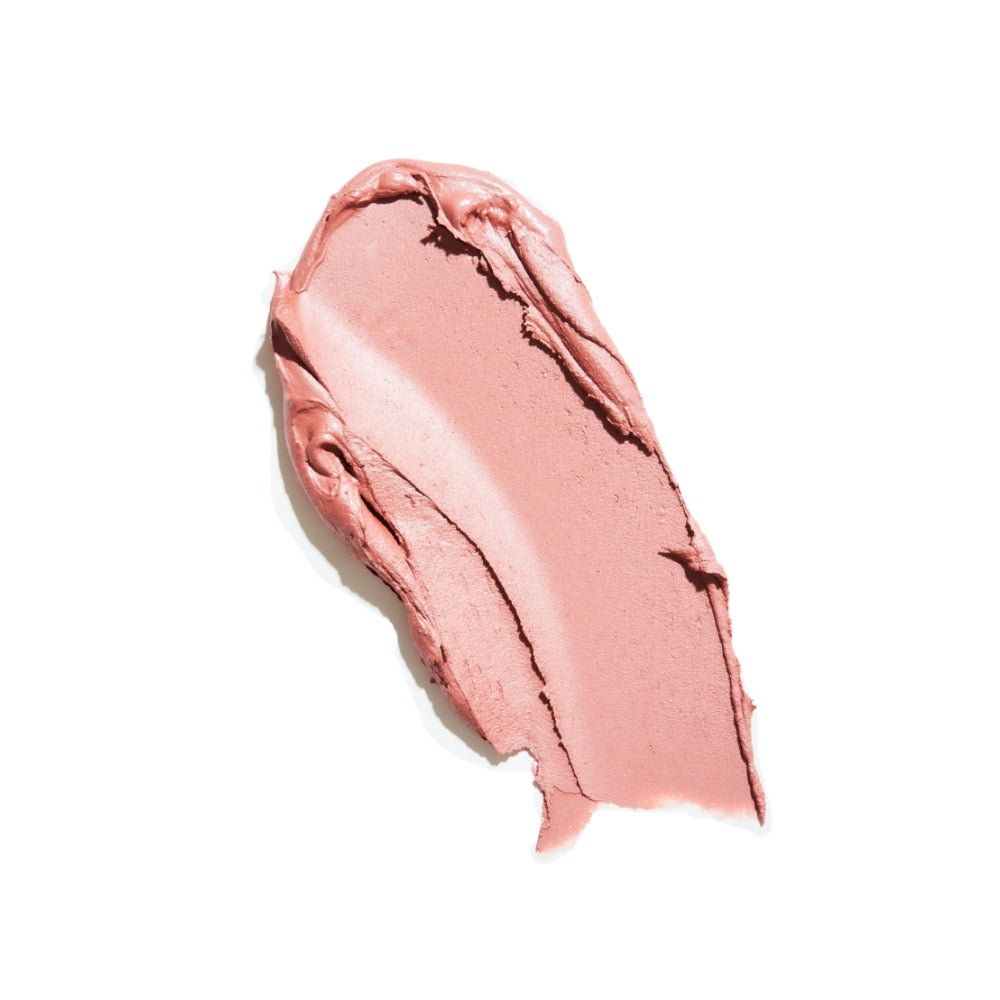 A smear of pink lipstick on a white background.