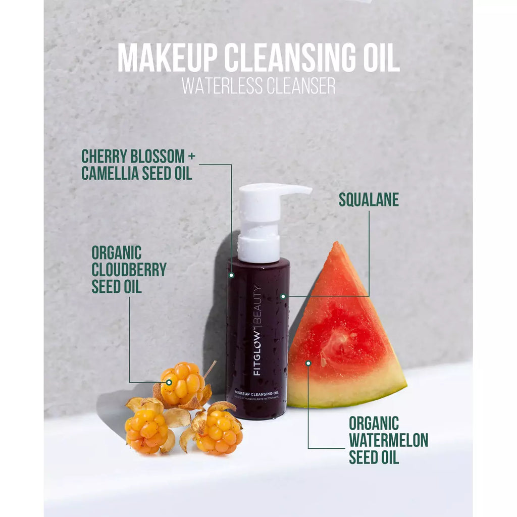 A promotional image for makeup cleansing oil highlighting its natural ingredients such as cherry blossom, camellia seed oil, squalane, cloudberry seed oil, and watermelon seed oil.