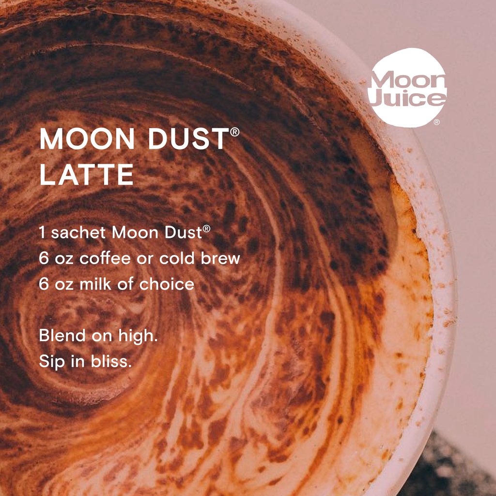 A close-up view of a swirling, creamy latte with a recipe for a "moon dust latte" from moon juice on the right side of the image.