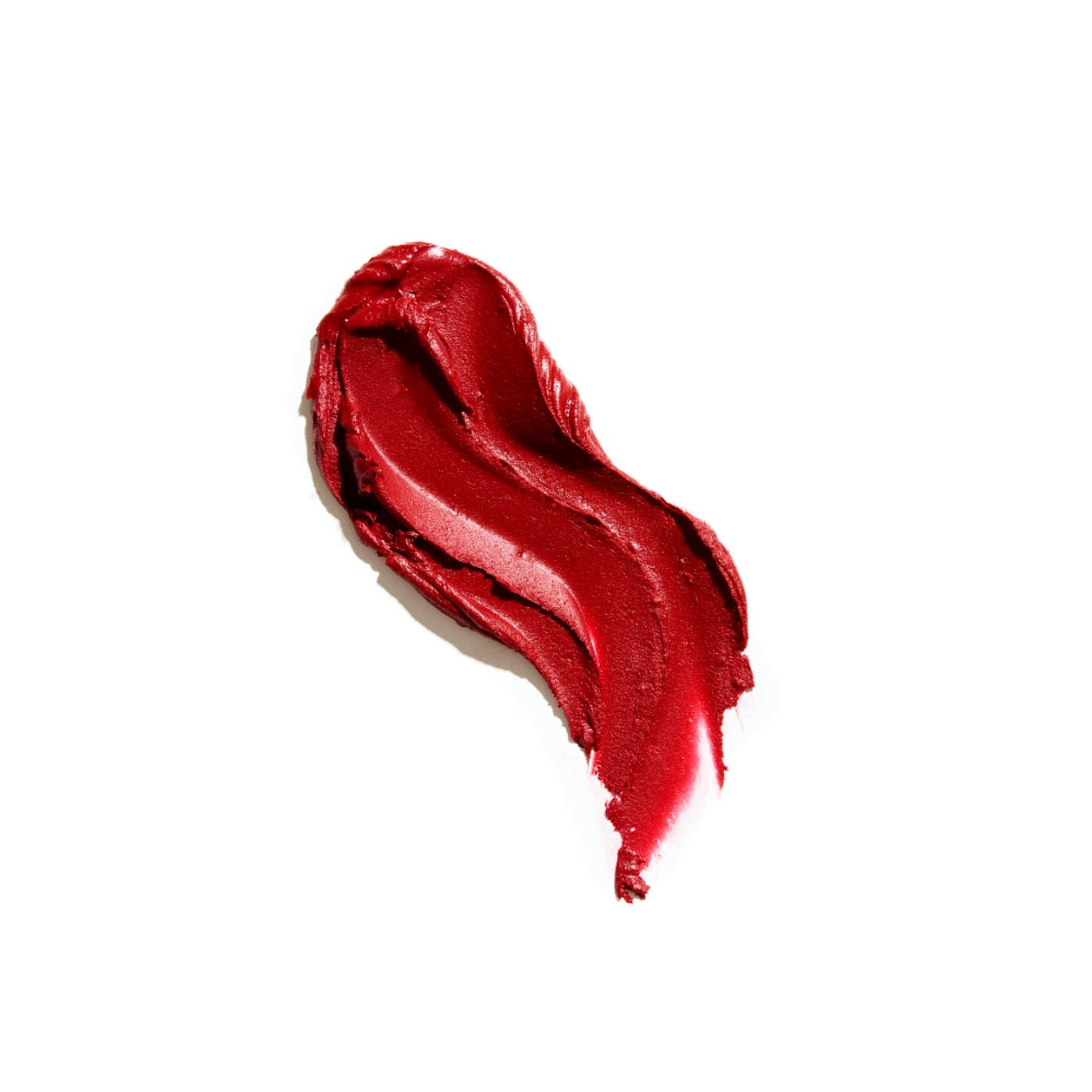 A smear of red lipstick isolated on a white background.