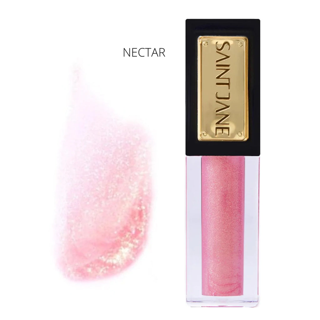 A swatch of 'nectar' lip gloss next to the product packaging for saint jane lip gloss.
