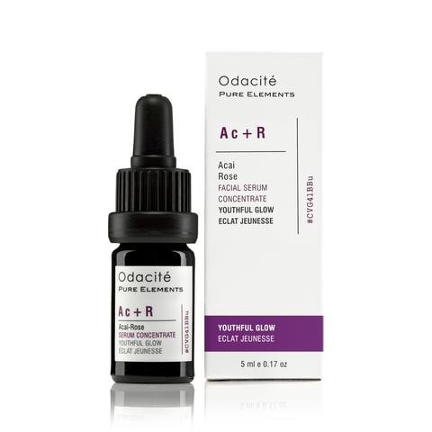 Bottle of odacite acai + rose youthful glow facial serum with its packaging.
