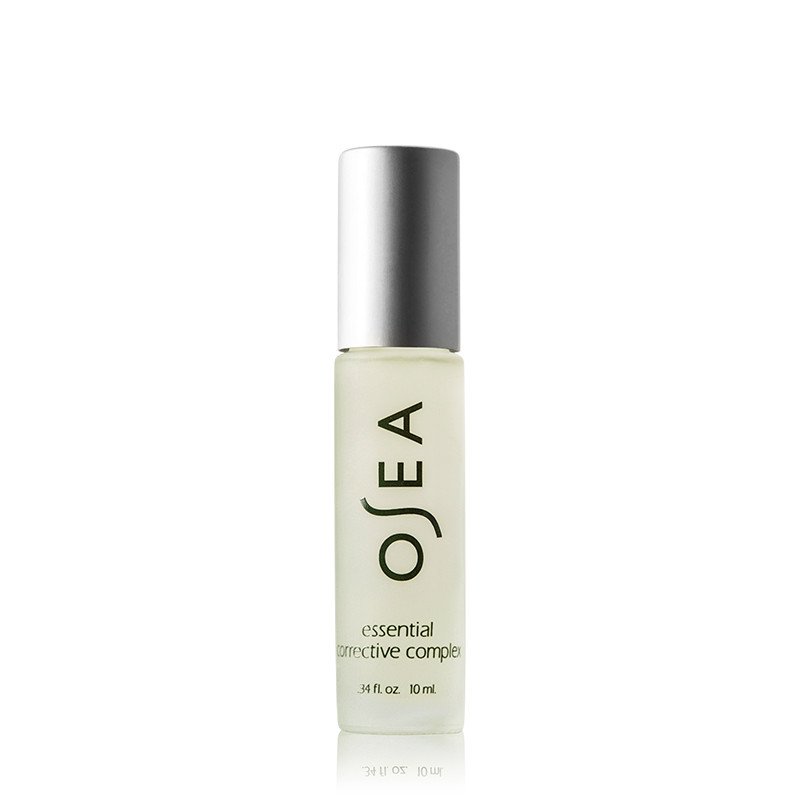 A bottle of osea essential corrective complex skincare oil.