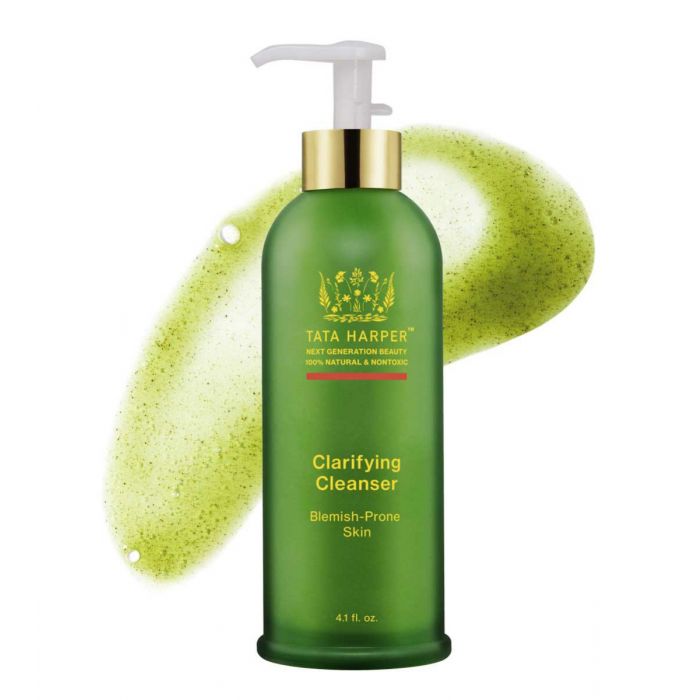 A bottle of tata harper clarifying cleanser with a green design and a pump, marketed for blemish-prone skin.