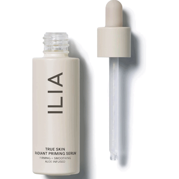 Bottle of ilia true skin radiant priming serum with a dropper applicator, on a white background.