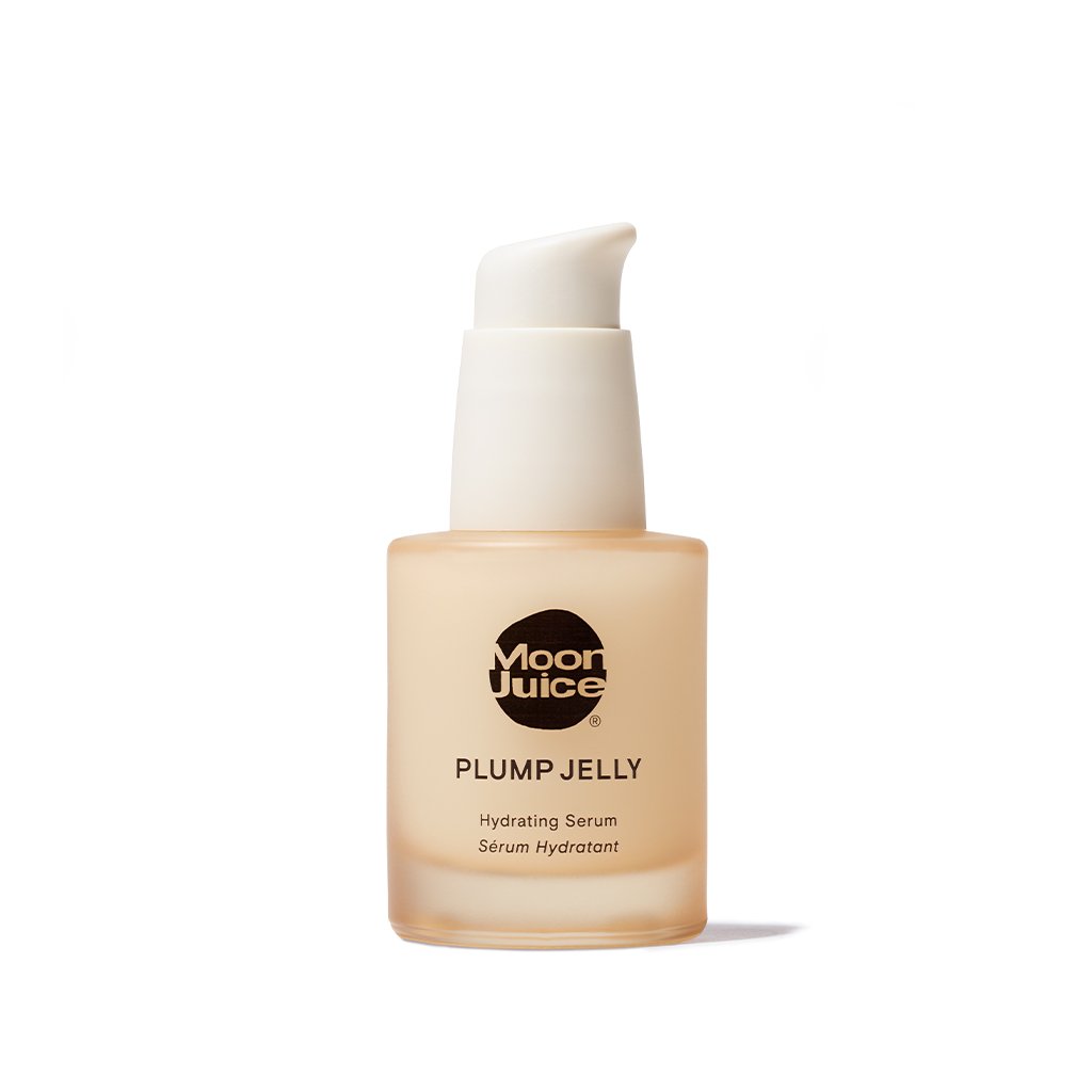 A bottle of moon juice plump jelly hydrating serum against a white background.