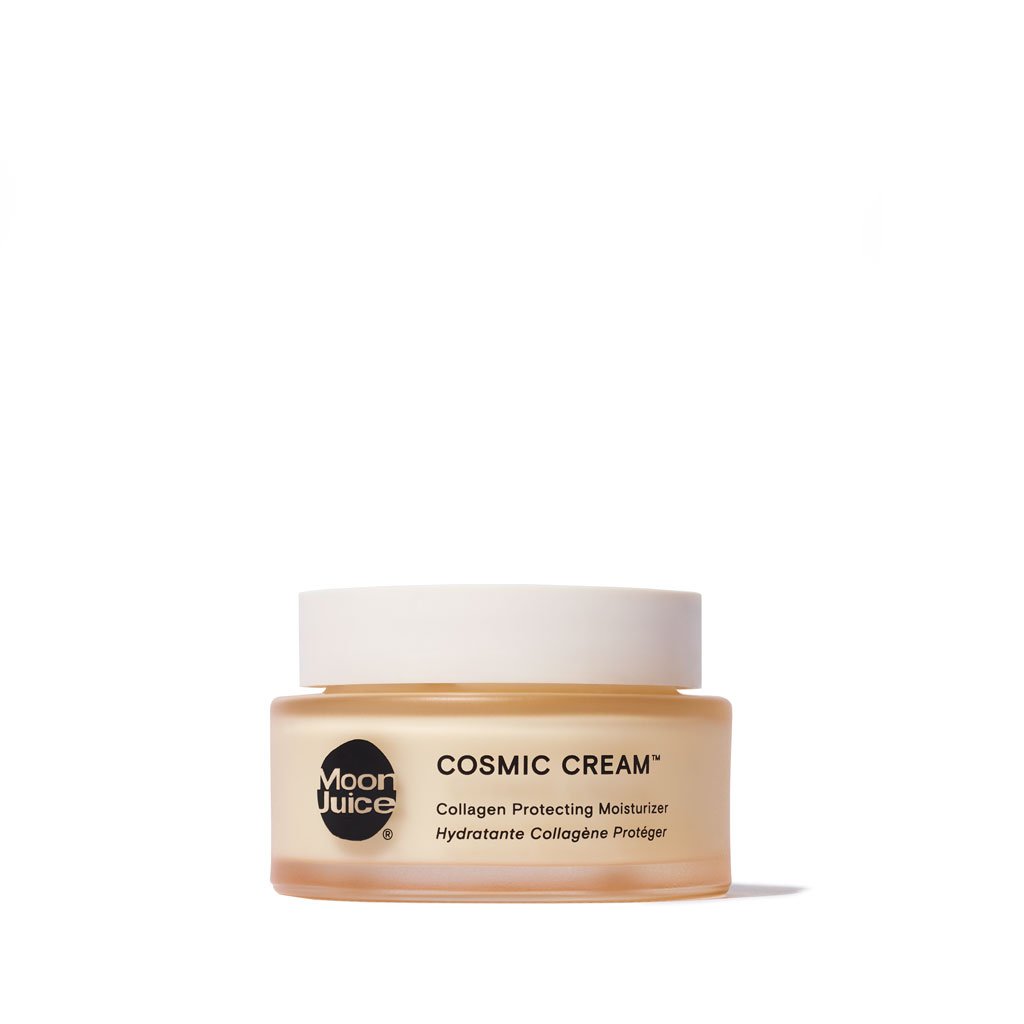 Jar of cosmic cream collagen protecting moisturizer by moon juice against a white background.