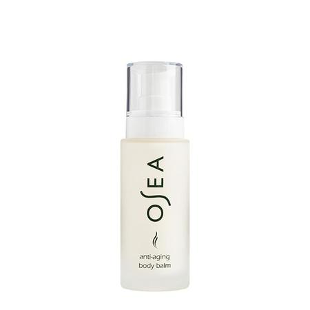 A bottle of osea anti-aging body balm with a pump dispenser.
