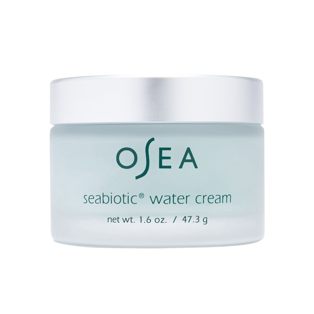 A jar of osea seabiotic water cream against a white background.
