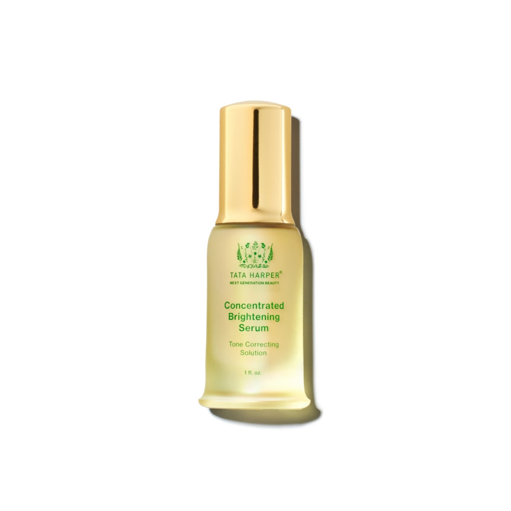 Bottle of tata harper concentrated brightening serum on a plain background.