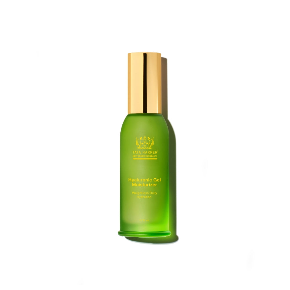 Green bottle of tata harper hyaluronic gel moisturizer against a white background.