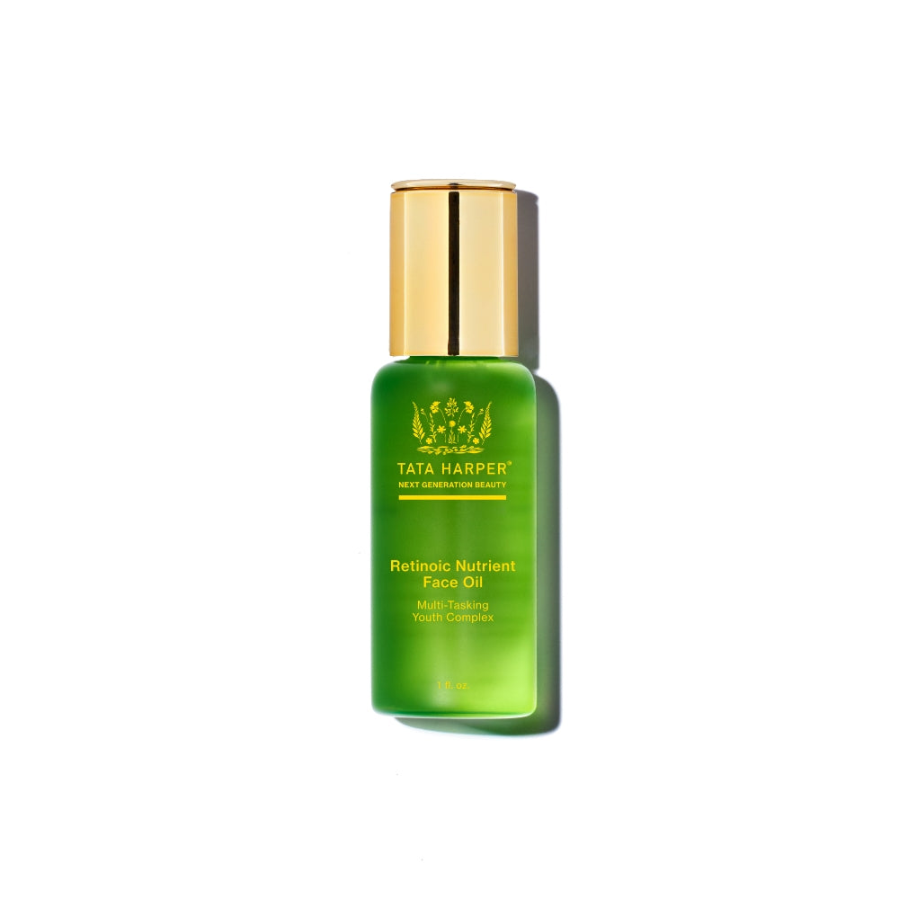 A bottle of tata harper retinoic nutrient face oil against a white background.