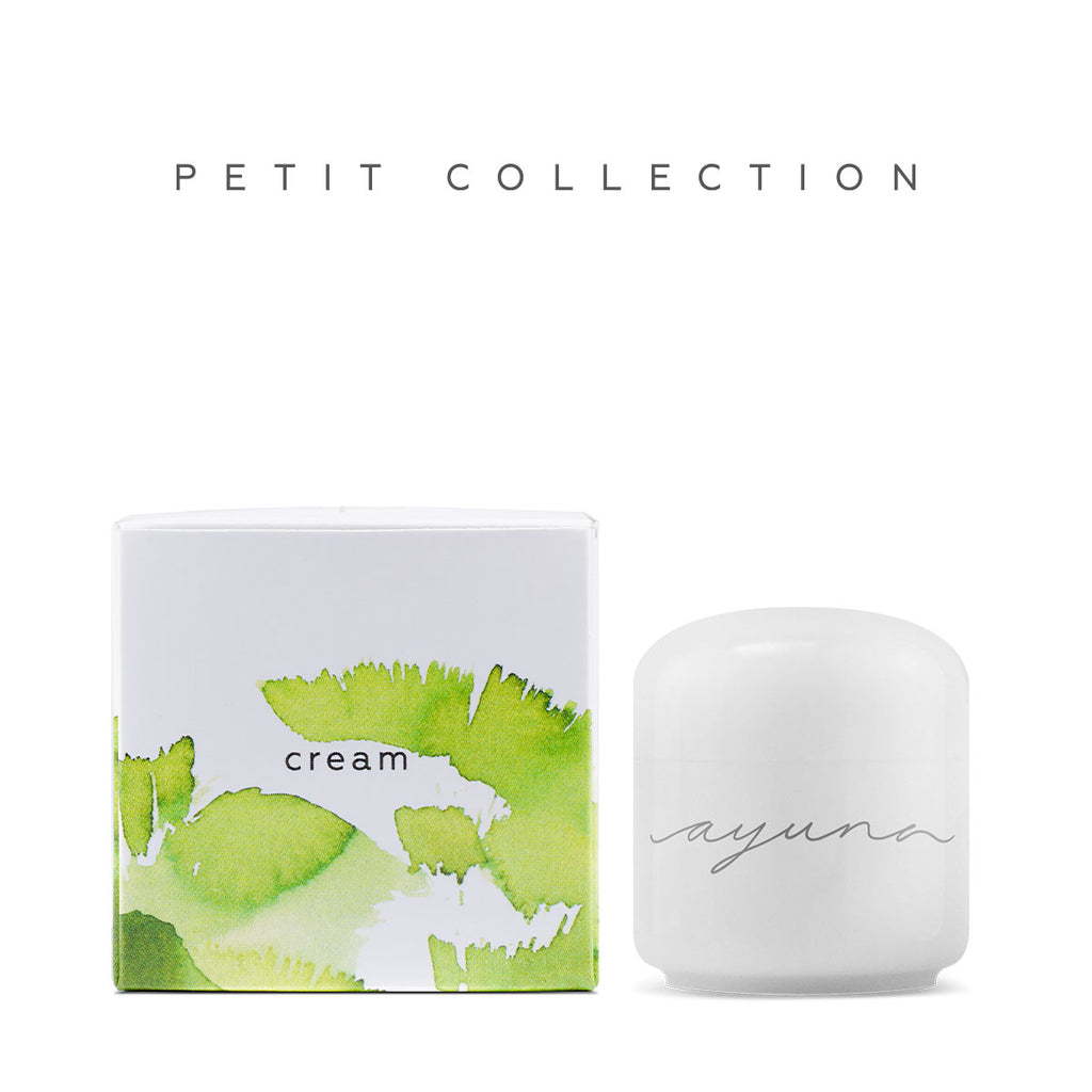 Cosmetic cream product from petit collection with green watercolor design packaging.