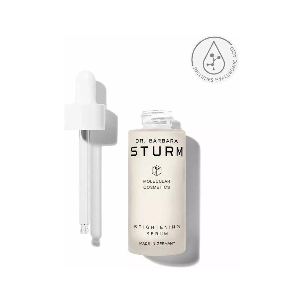 A bottle of dr. barbara sturm brightening serum with a dropper applicator, made in germany and including hyaluronic acid.