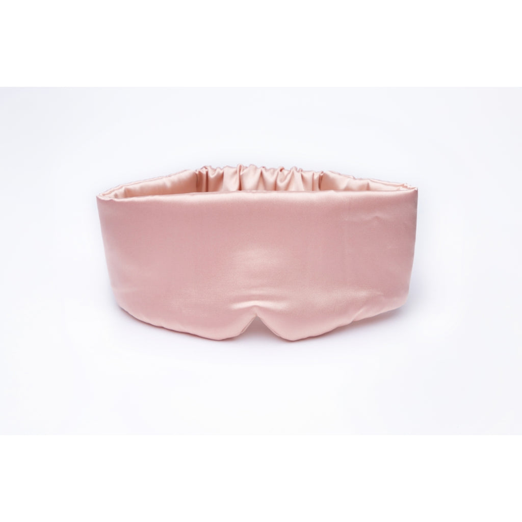 Pink satin hairband on a white background.