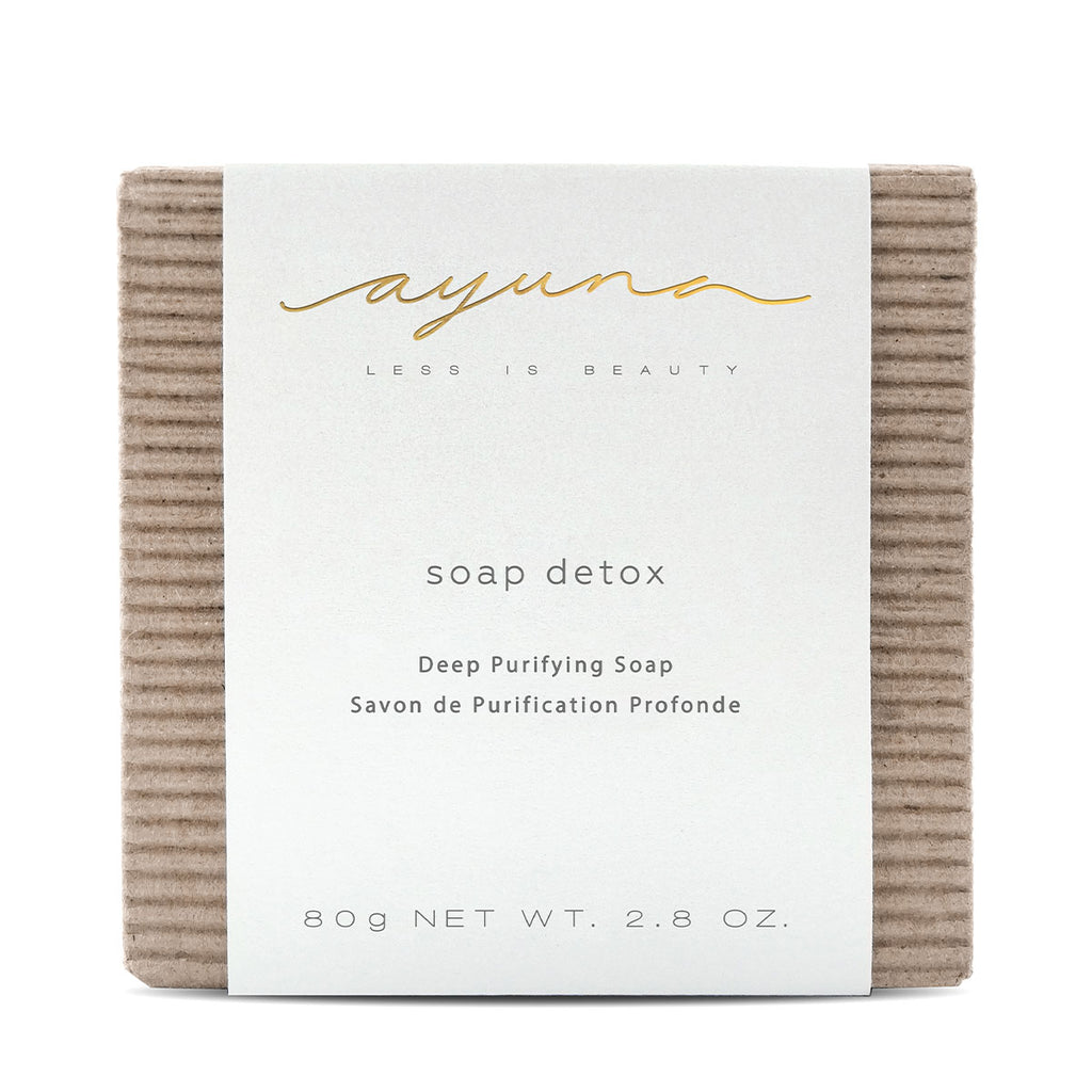 Bar of detox soap with minimalist packaging.