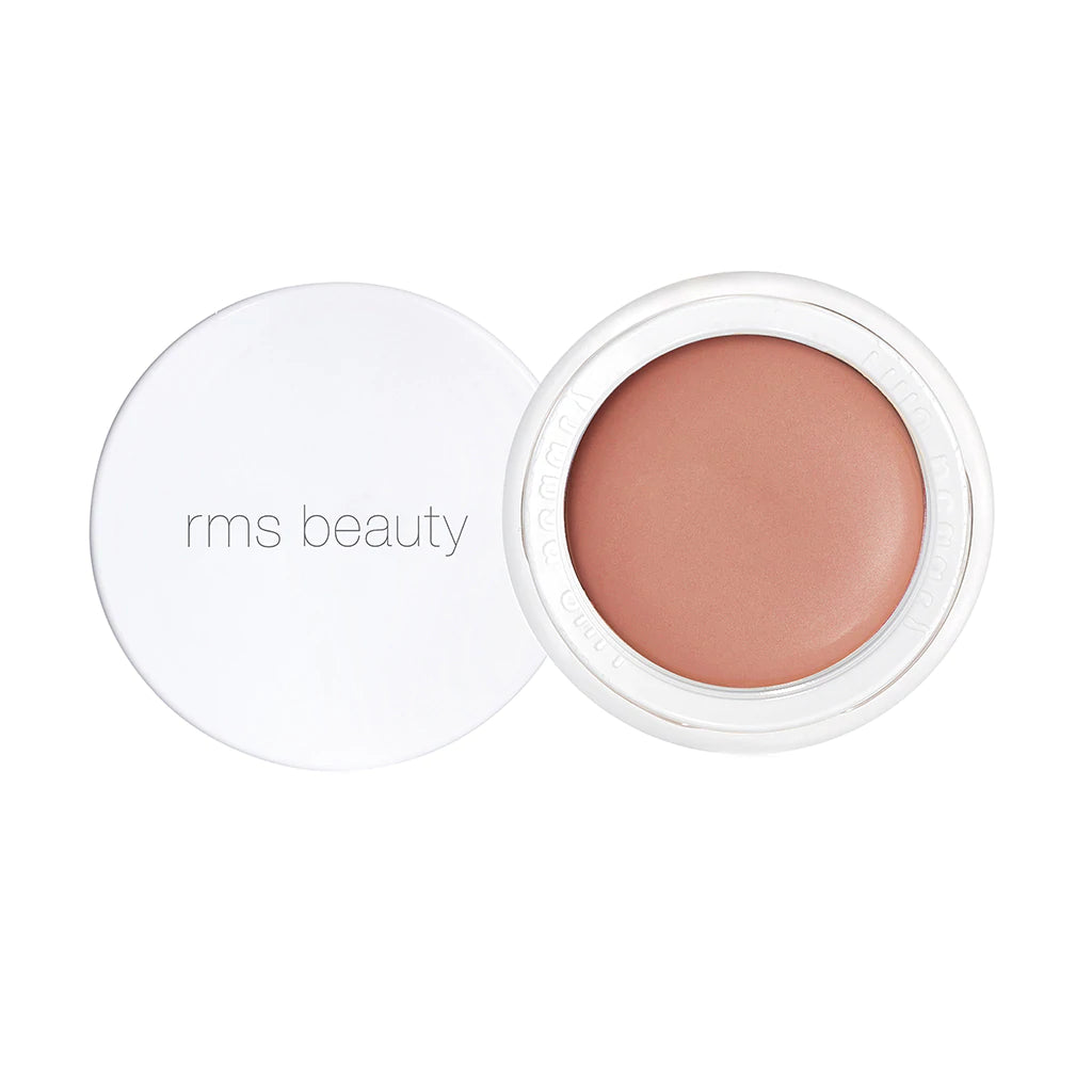 Open container of rms beauty blush showing the product and brand label.