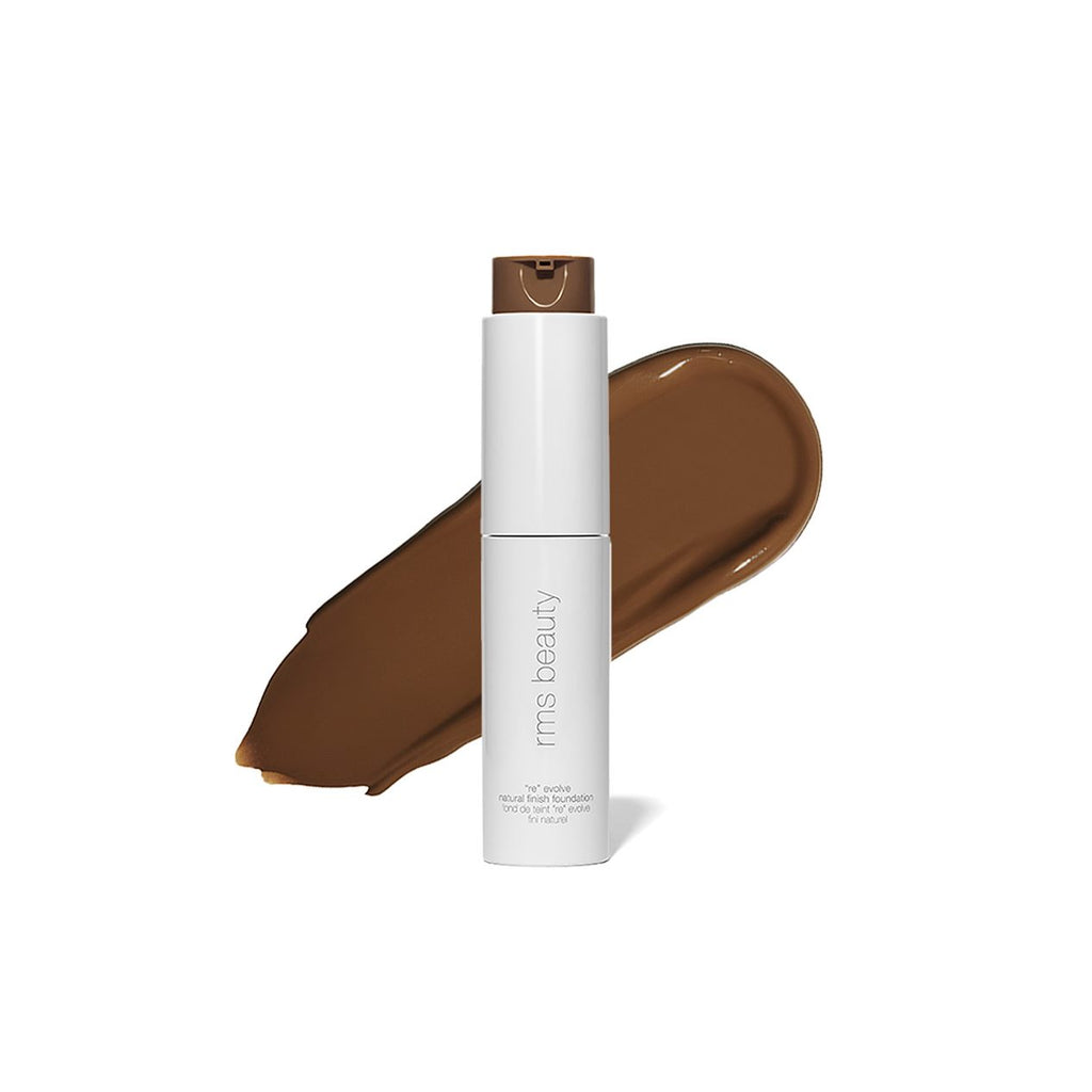 Foundation stick with swatch of dark shade makeup.