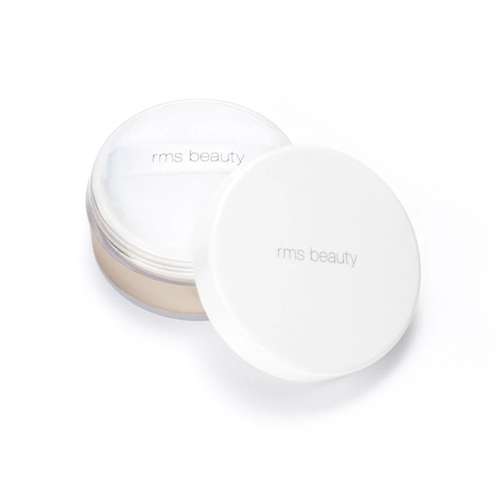 A container of rms beauty product on a white background.