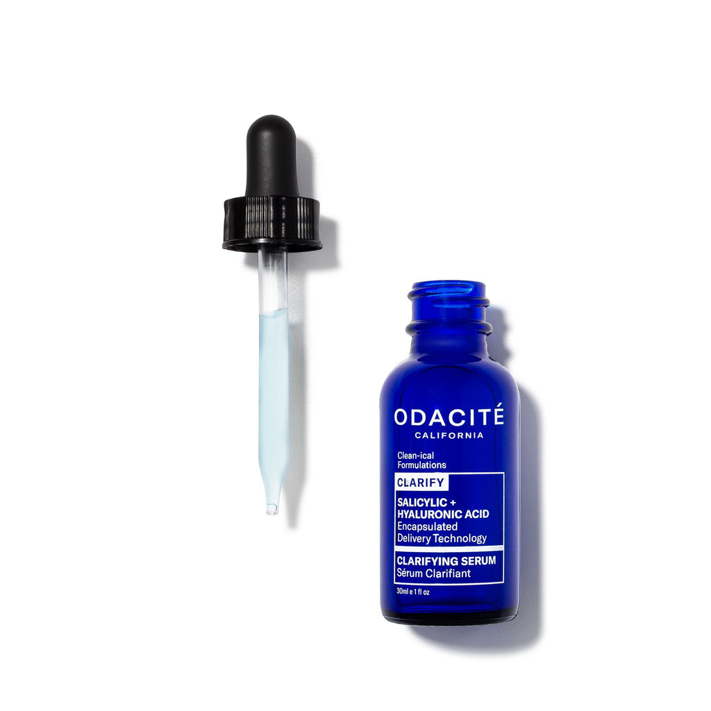 A serum bottle with a dropper on a white background.