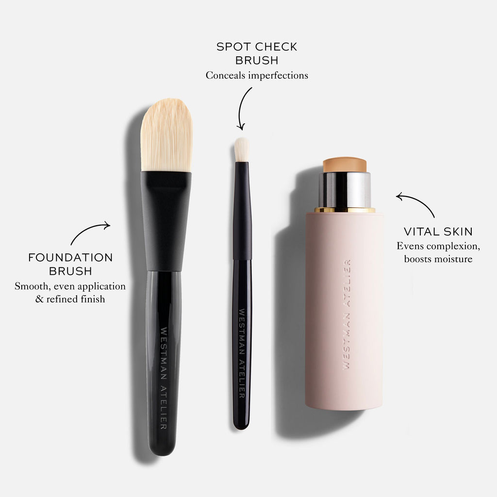 An array of beauty products including a foundation brush, spot check brush, and a bottle of skin moisturizer, each labeled with its specific use.