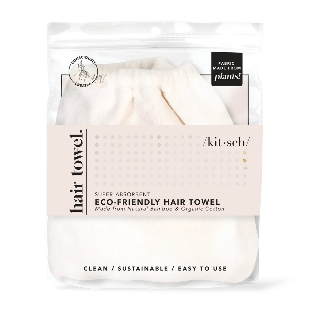 Eco-friendly hair towel packaging with product visible through transparent material, highlighting its sustainability and ease of use.