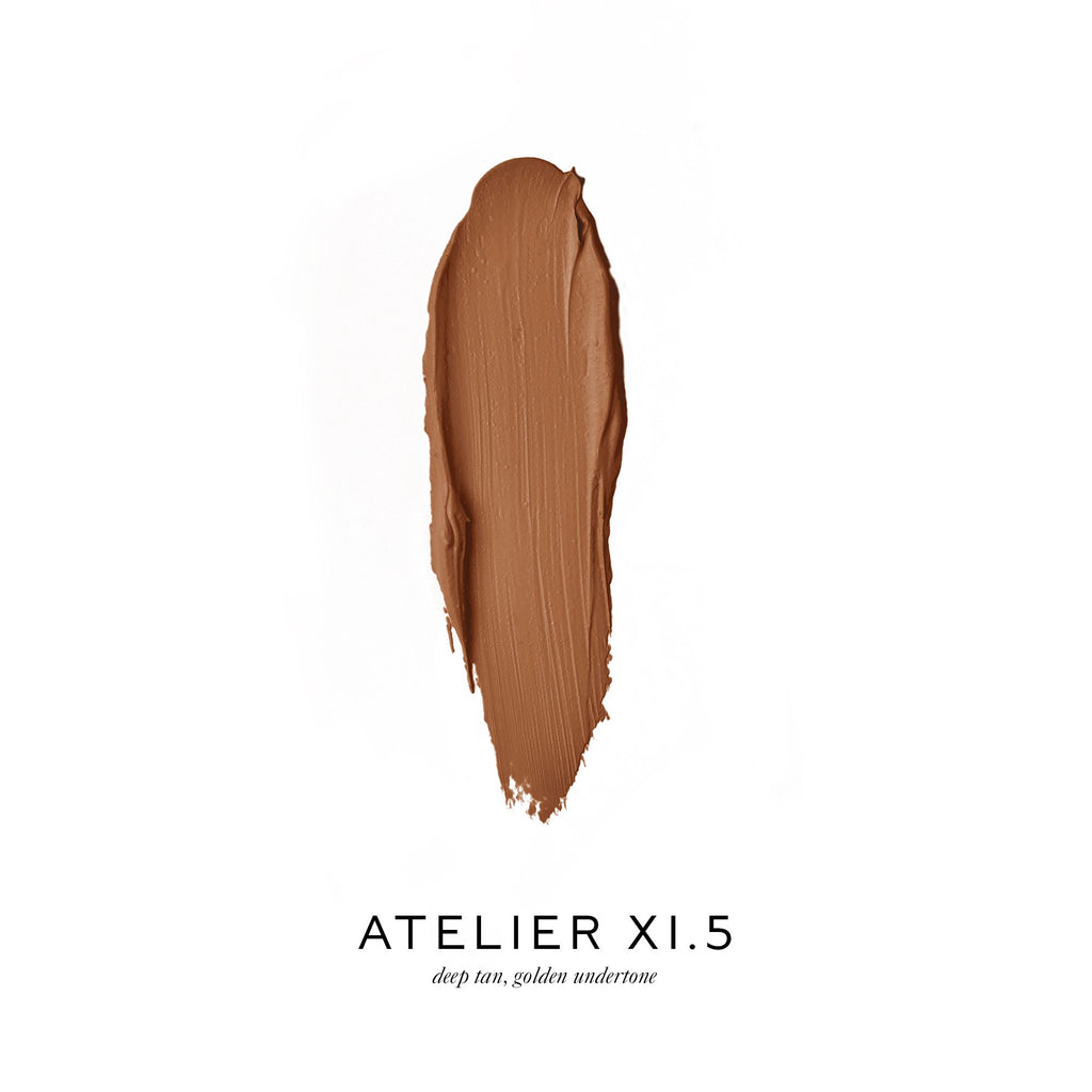 A swatch of foundation makeup labelled "atelier xi.5 - deep tan, golden undertone.