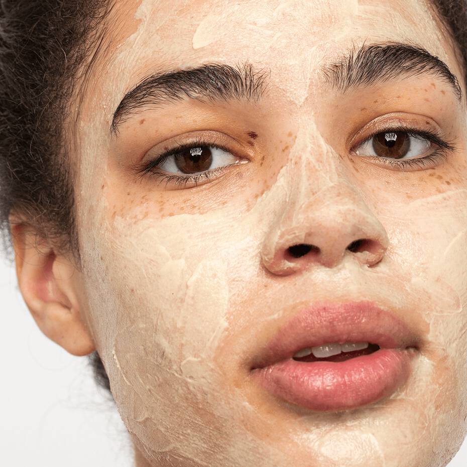 Close-up of a person with a peeling facial mask.